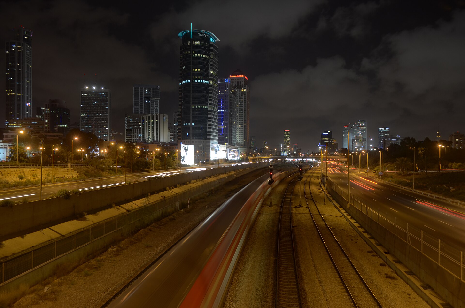 Long-exposure light trails on a highway at night